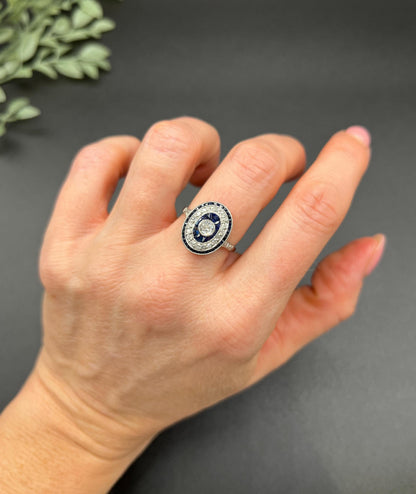 Antique Platinum, Edwardian era Sapphire & Diamond Oval Halo Cluster ring