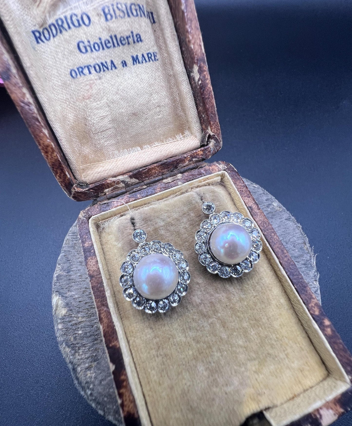 A pair of pearl and old cut diamond floral cluster earrings in an antique box