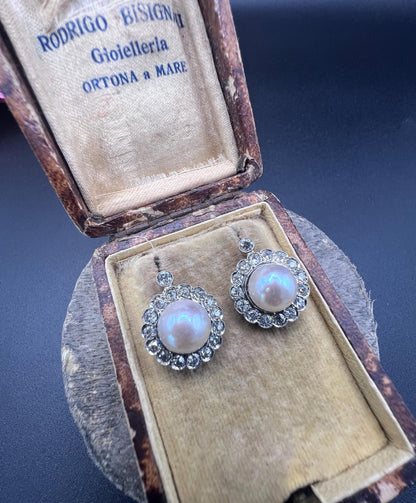 A pair of pearl and old cut diamond floral cluster earrings in an antique box