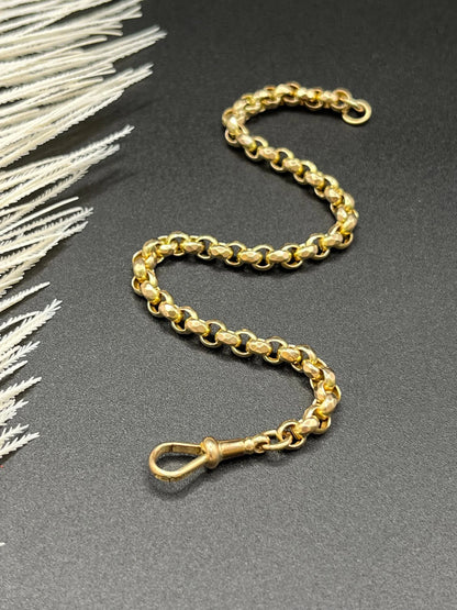 A yellow gold round link bracelet with a lobster claw clasp