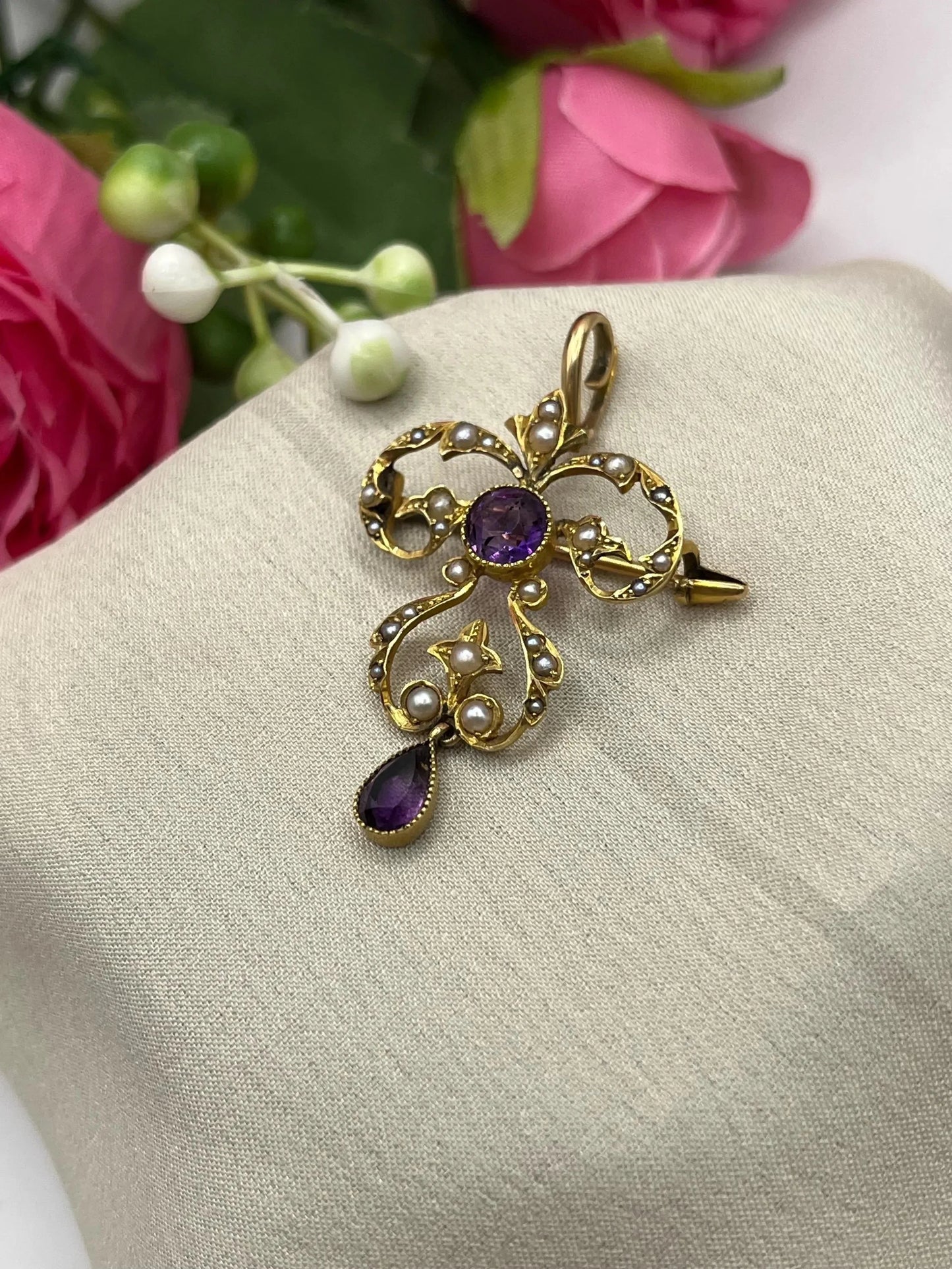 A yellow gold amethyst and seed pearl pendant/brooch