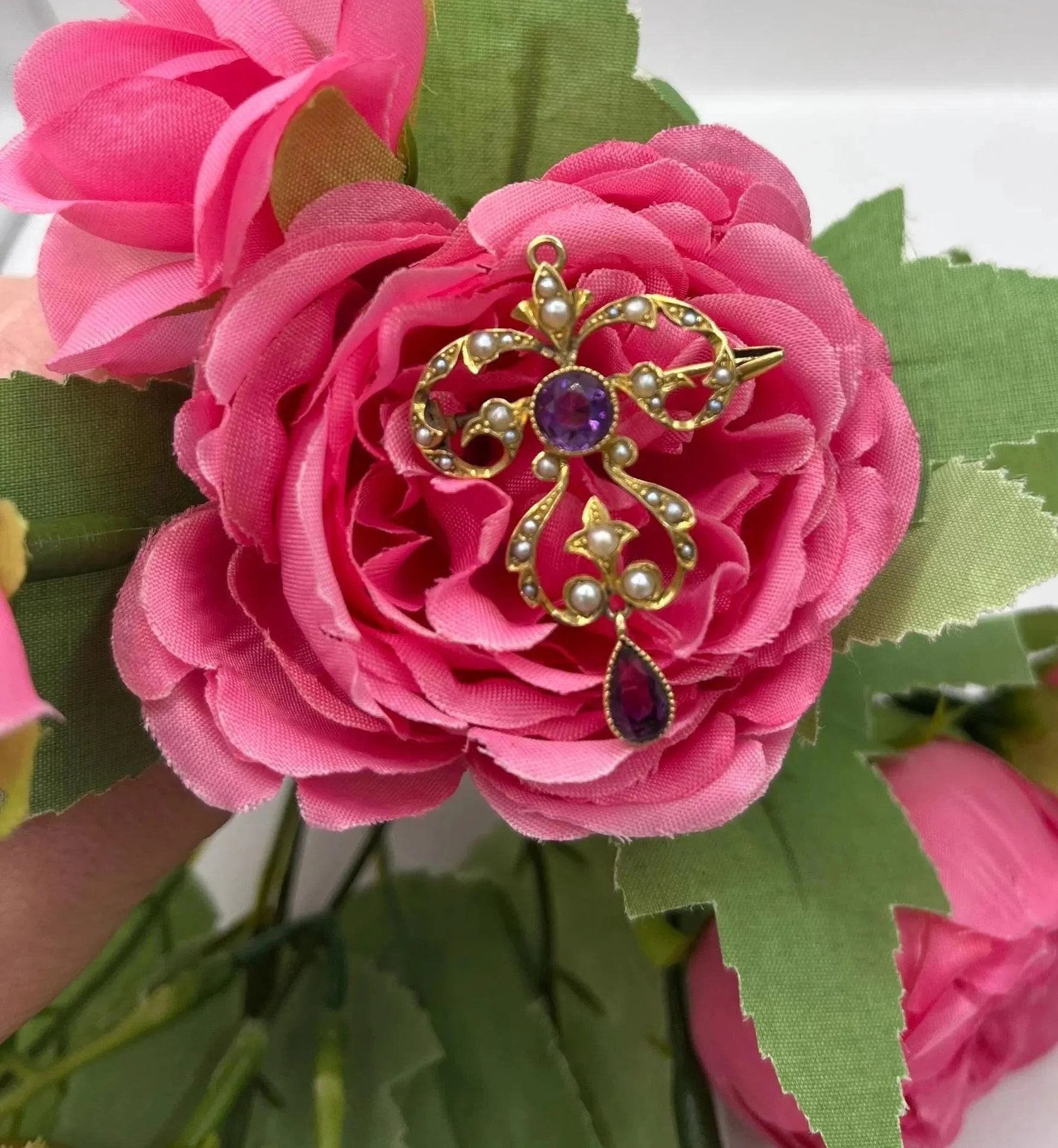 A yellow gold amethyst and seed pearl pendant/brooch