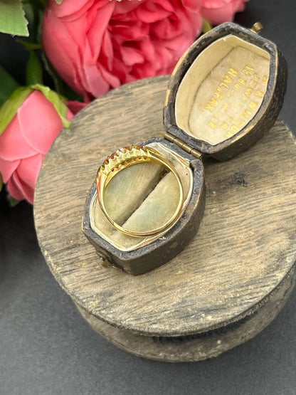 A yellow gold multi-gemstone acrostic ring, in an antique ring box