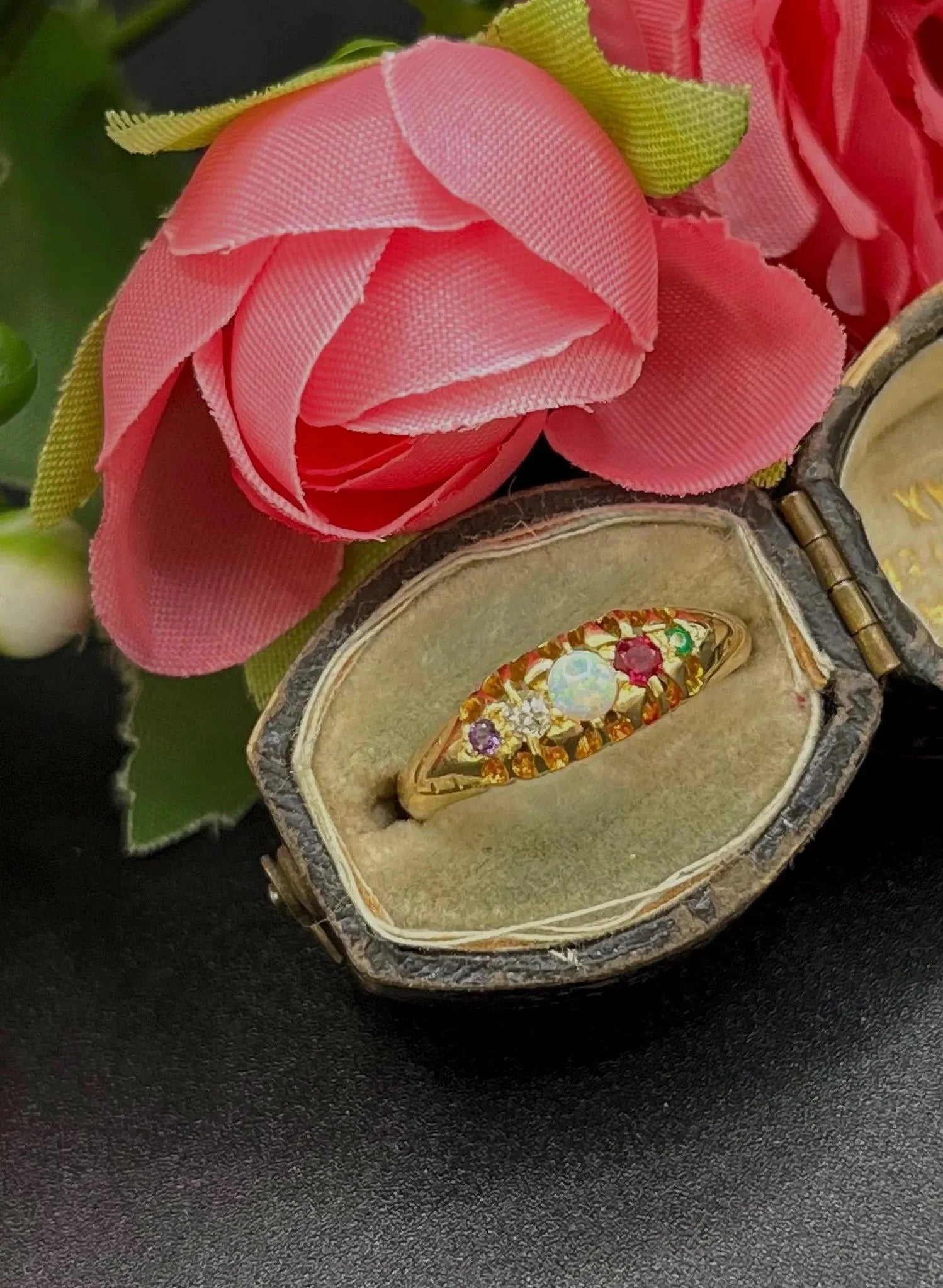 A yellow gold multi-gemstone acrostic ring, in an antique ring box