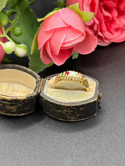 A yellow gold multi-gemstone acrostic ring, in an antique ring box