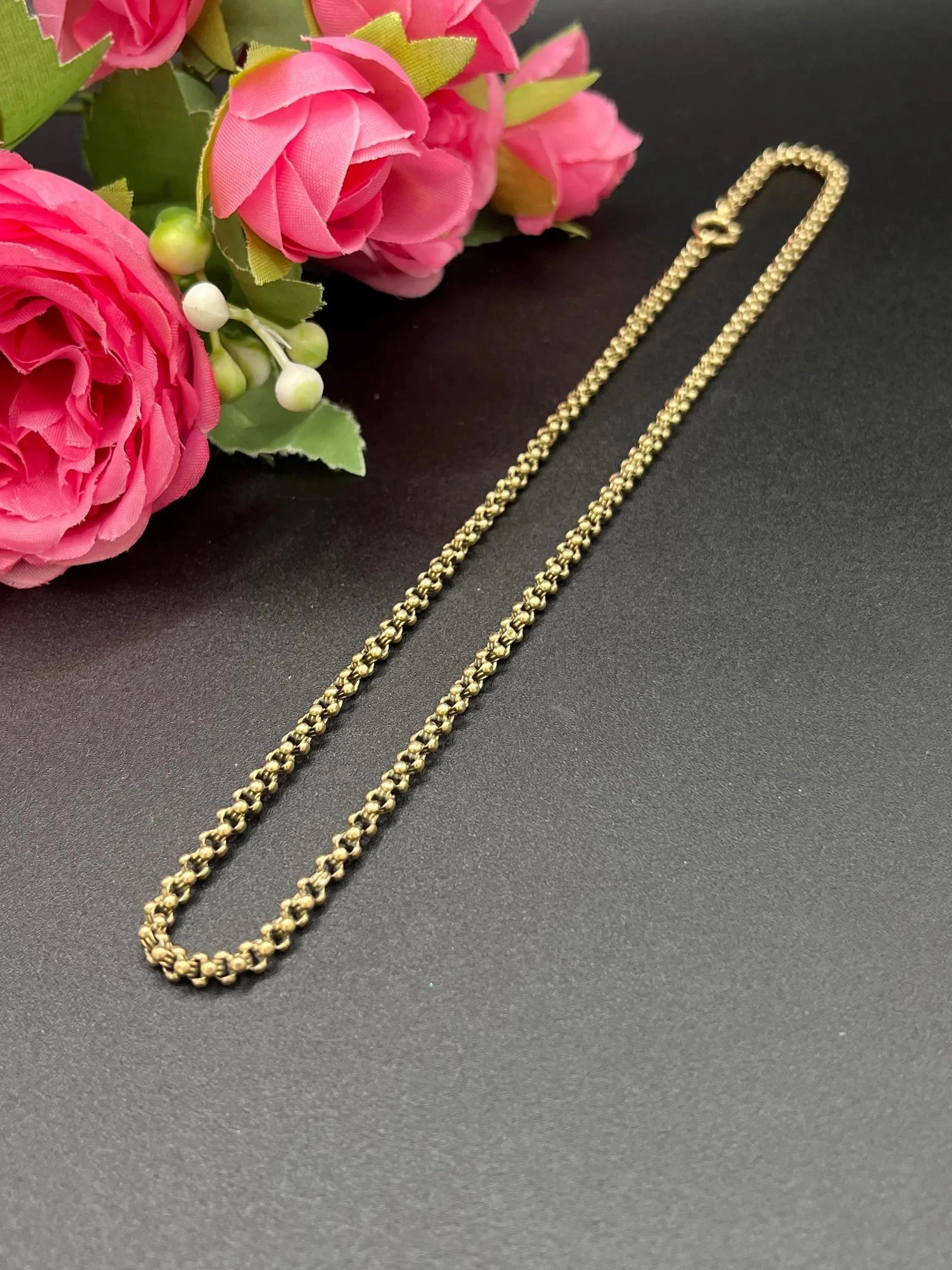 A yellow gold belcher link chain necklace