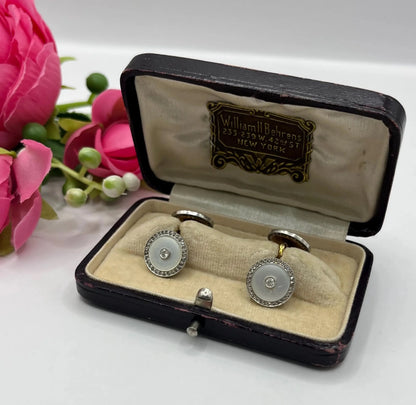 A pair of round diamond and mother of pearl cufflinks in yellow and white gold, in an antique box
