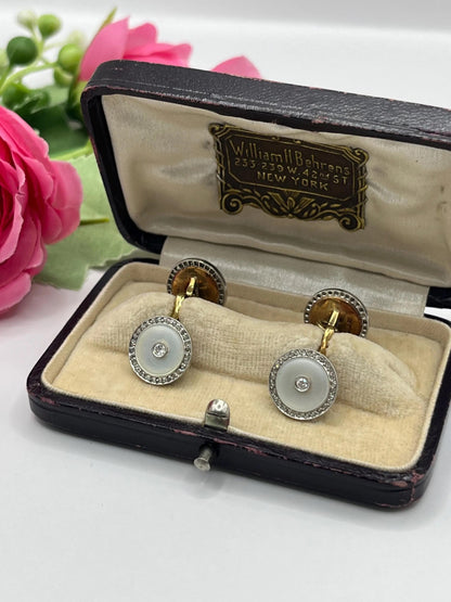 A pair of round diamond and mother of pearl cufflinks in yellow and white gold, in an antique box