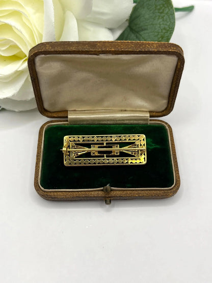 A rectangular brooch with sapphire, pearls and diamonds in gold and platinum, in an antique box