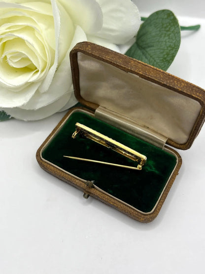 A rectangular brooch with sapphire, pearls and diamonds in gold and platinum, in an antique box