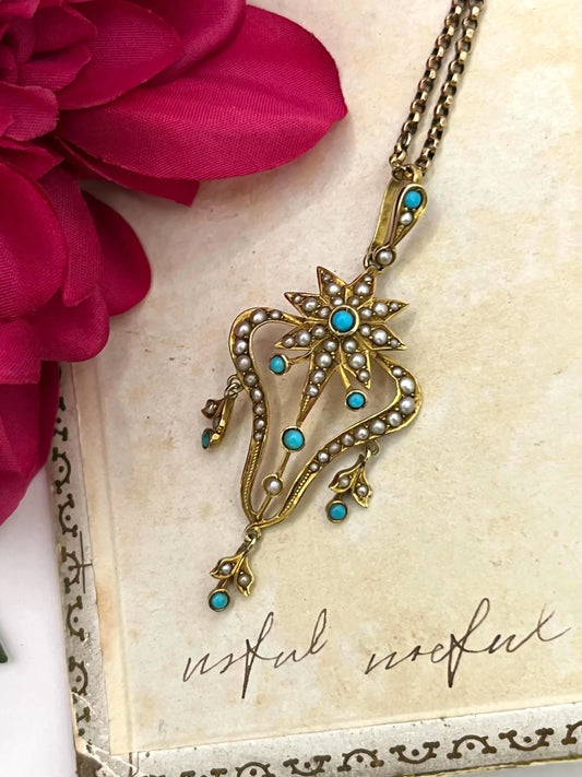 A yellow gold turquoise and pearl decorative openwork drop pendant, with a gold chain