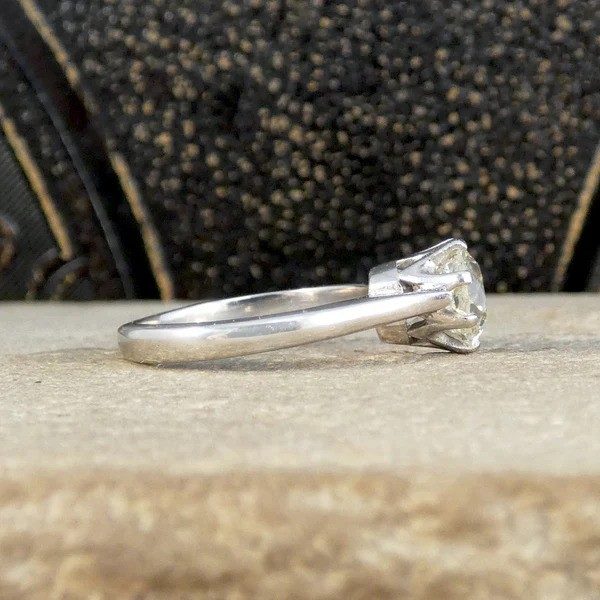 Old cut diamond engagement ring in white gold.