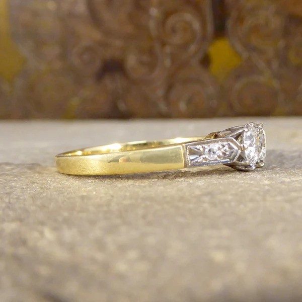 Diamond two stone ring set in white and yellow gold. 