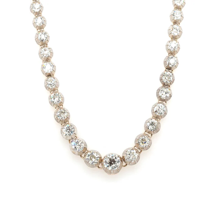 Antique Diamond line necklace in gold and silver.