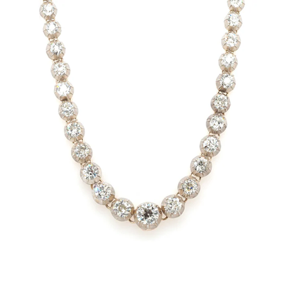 Antique Diamond line necklace in gold and silver.