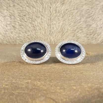 Sapphire and diamond stud earrings in white gold.