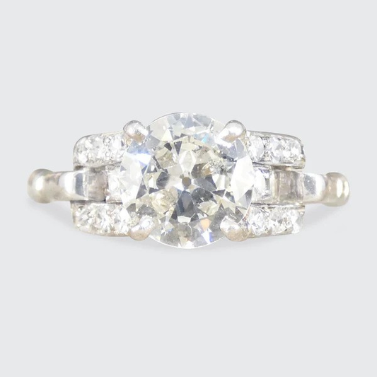 Vintage 1.12 Carat Diamond Ring With Diamond Set Staged Shoulders In Platinum