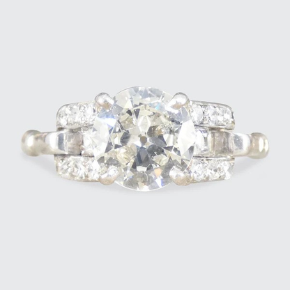 Vintage 1.12 Carat Diamond Ring With Diamond Set Staged Shoulders In Platinum