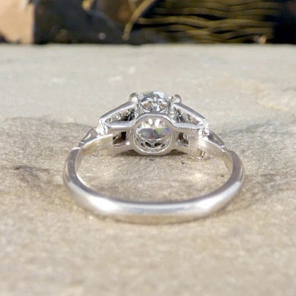 Vintage 1.12 Carat Diamond Ring With Diamond Set Staged Shoulders In Platinum