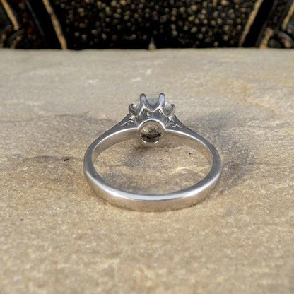 Old cut diamond engagement ring in white gold.