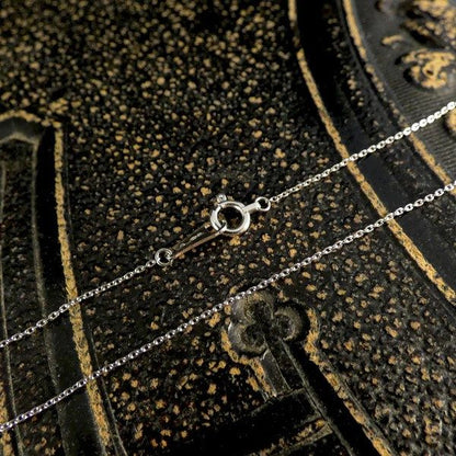 Sapphire and diamond pendant necklace in platinum.