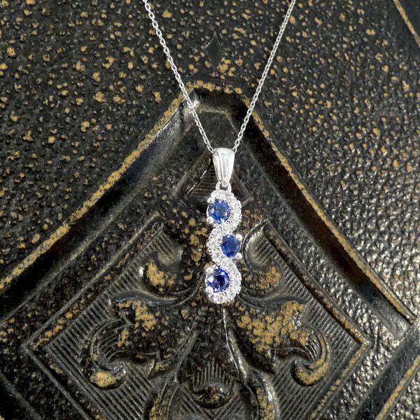 Sapphire and diamond pendant necklace in platinum.