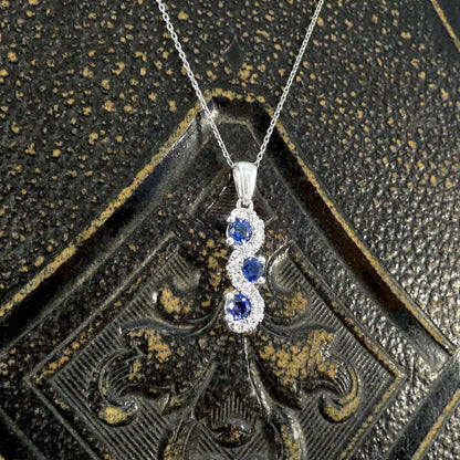Sapphire and diamond pendant necklace in platinum.