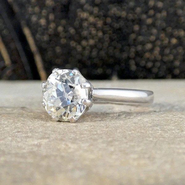 Old cut diamond engagement ring in white gold.