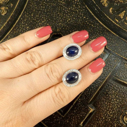 Sapphire and diamond stud earrings in white gold.