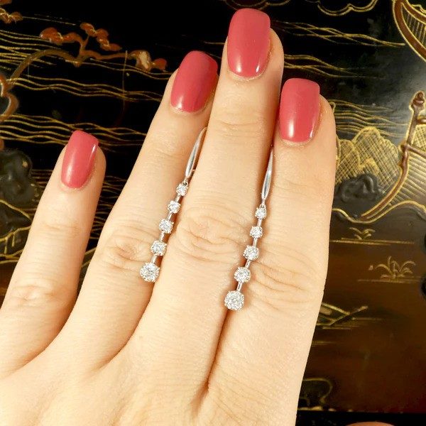 Diamond drop earrings in white gold.