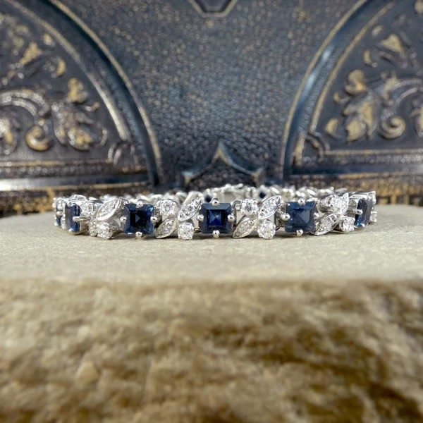 Sapphire and diamond line bracelet in white gold.