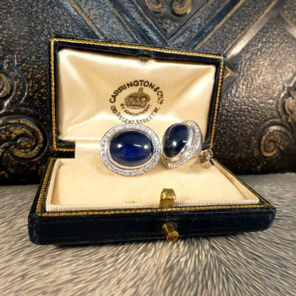 Sapphire and diamond stud earrings in white gold.