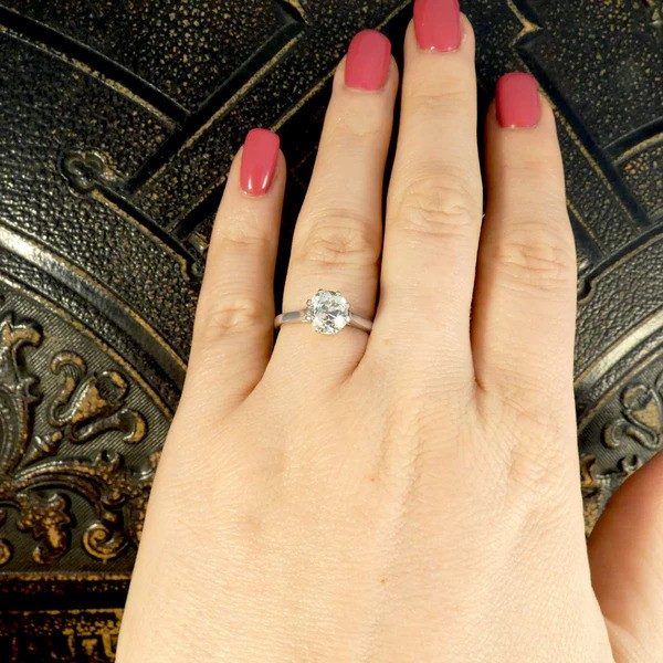 Old cut diamond engagement ring in white gold.