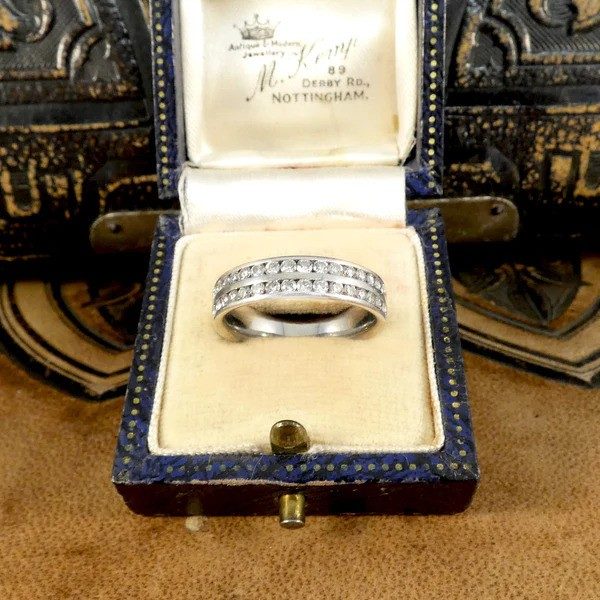 Diamond half eternity ring in platinum. 