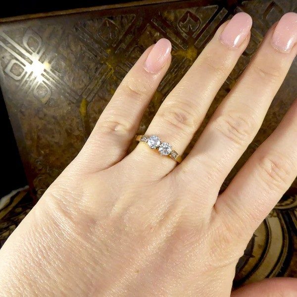 Diamond two stone ring set in white and yellow gold. 