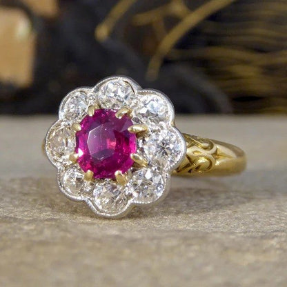 Ruby and diamond cluster ring in yellow and white gold.