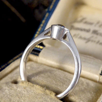 Diamond solitaire ring in white gold.