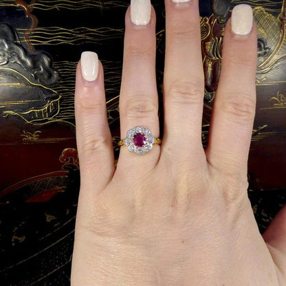 Ruby and diamond cluster ring in yellow and white gold.