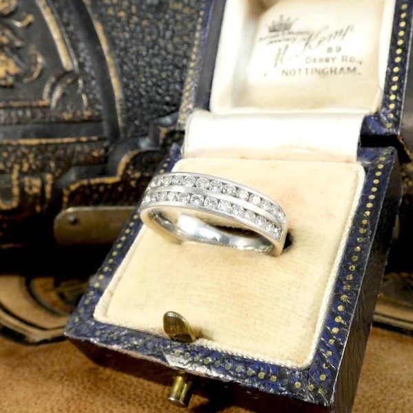 Diamond half eternity ring in platinum. 