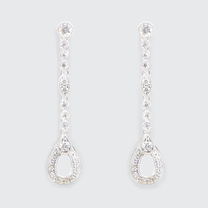 Diamond set drop earrings in white gold.