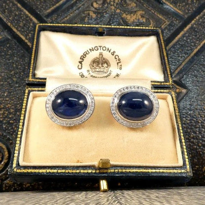 Sapphire and diamond stud earrings in white gold.
