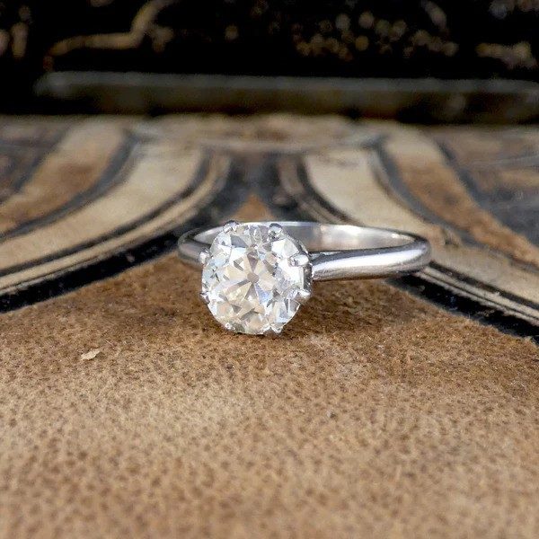 Old cut diamond engagement ring in white gold.