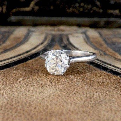 Old cut diamond engagement ring in white gold.