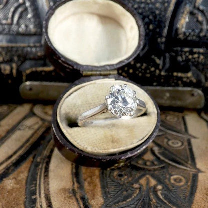 Old cut diamond engagement ring in white gold.