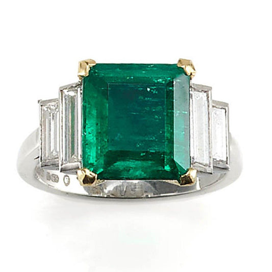 Emerald diamond ring in platinum.
