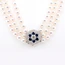 Pearl Necklace With 18 Carat White Gold, Diamond And Sapphire Clasp
