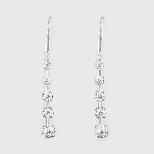 Diamond drop earrings in white gold.