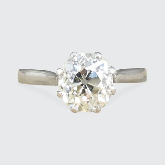 Old cut diamond engagement ring in white gold.