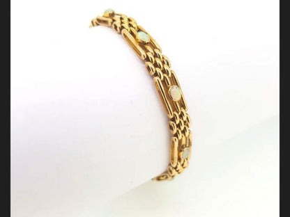 Victorian gate bracelet, set with opals, 15ct yellow gold