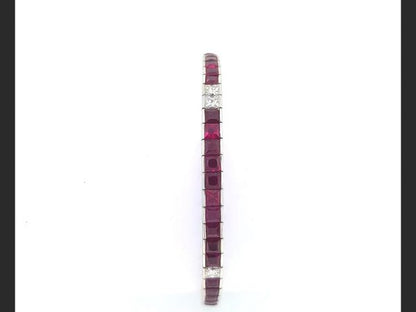 Ruby and Diamond Line Bracelet, set with French cut rubies and princess cut diamonds, total gemstone estimated weight 7.80 carats. in 18ct white gold